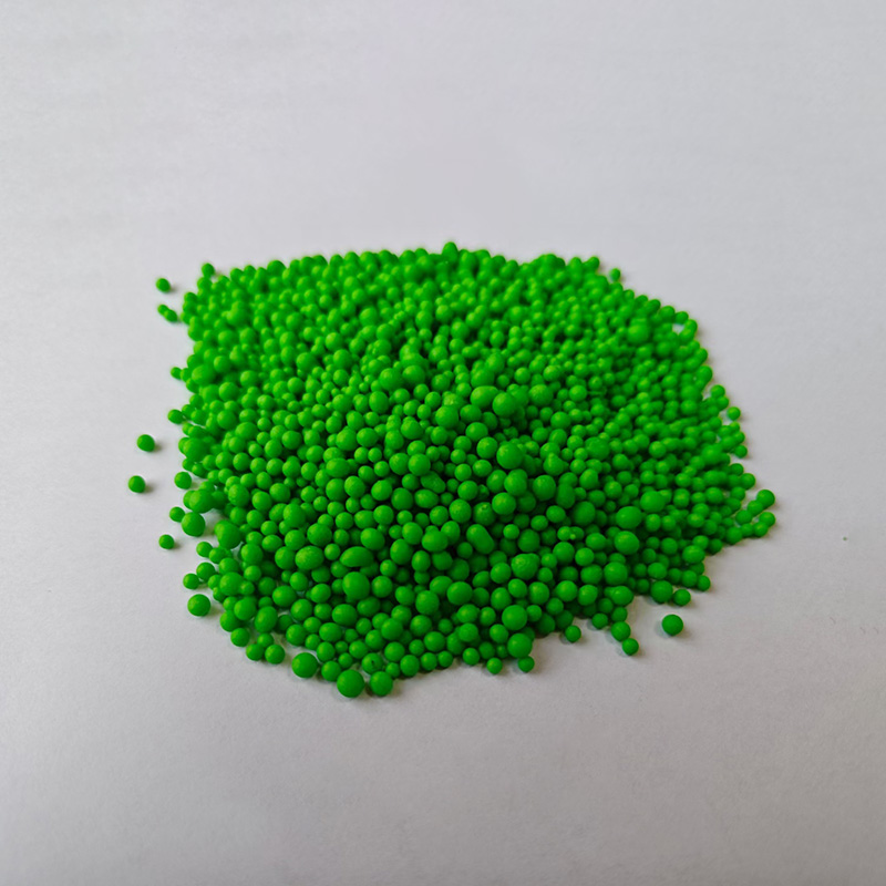 Green granular compound fertiliser, close-up